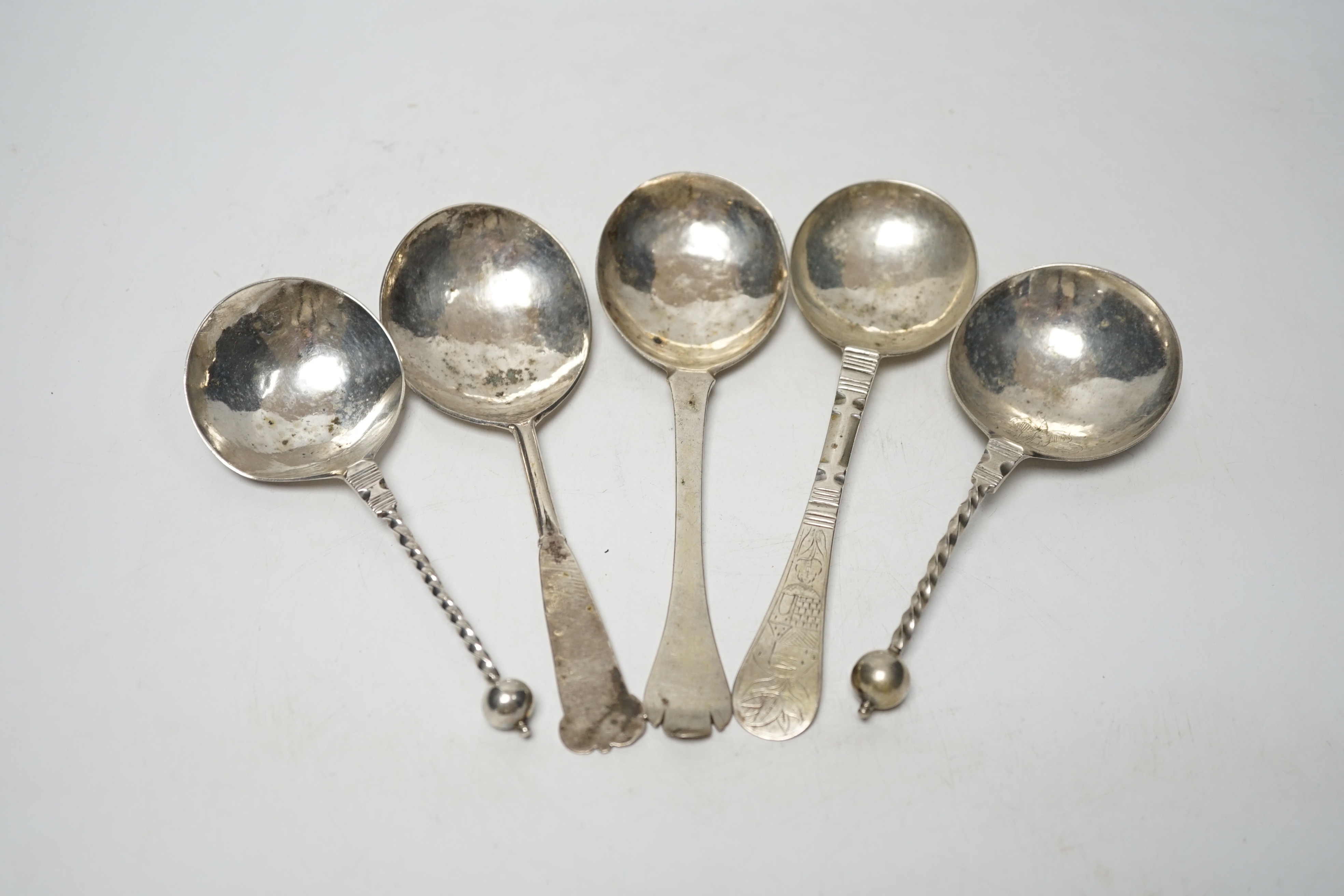 Five assorted 19th century and later Scandinavian? white metal spoons, two with maker's marks, largest 18cm.